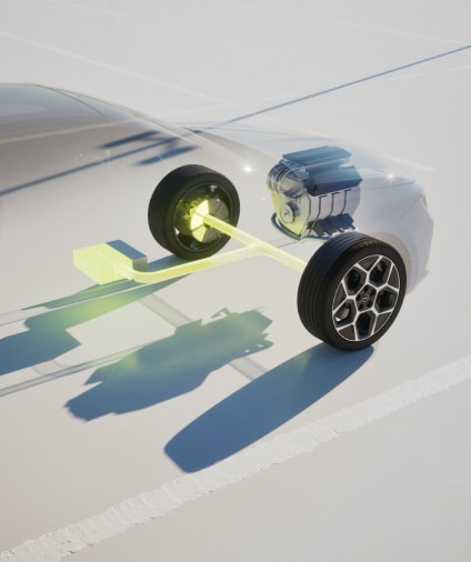 Abbildung Elektromotor, Hybridantrieb und Räder als Veranschaulichung der großen Reichweite
