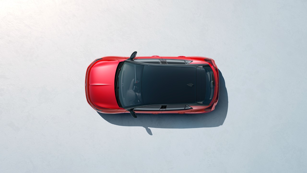 Draufsicht auf den neuen Opel Corsa in Rot mit schwarzem Dach